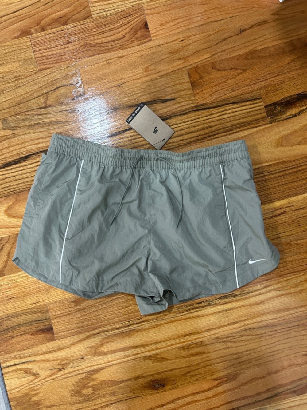 Nike Grey Women's Athletic Running Shorts with White Piping